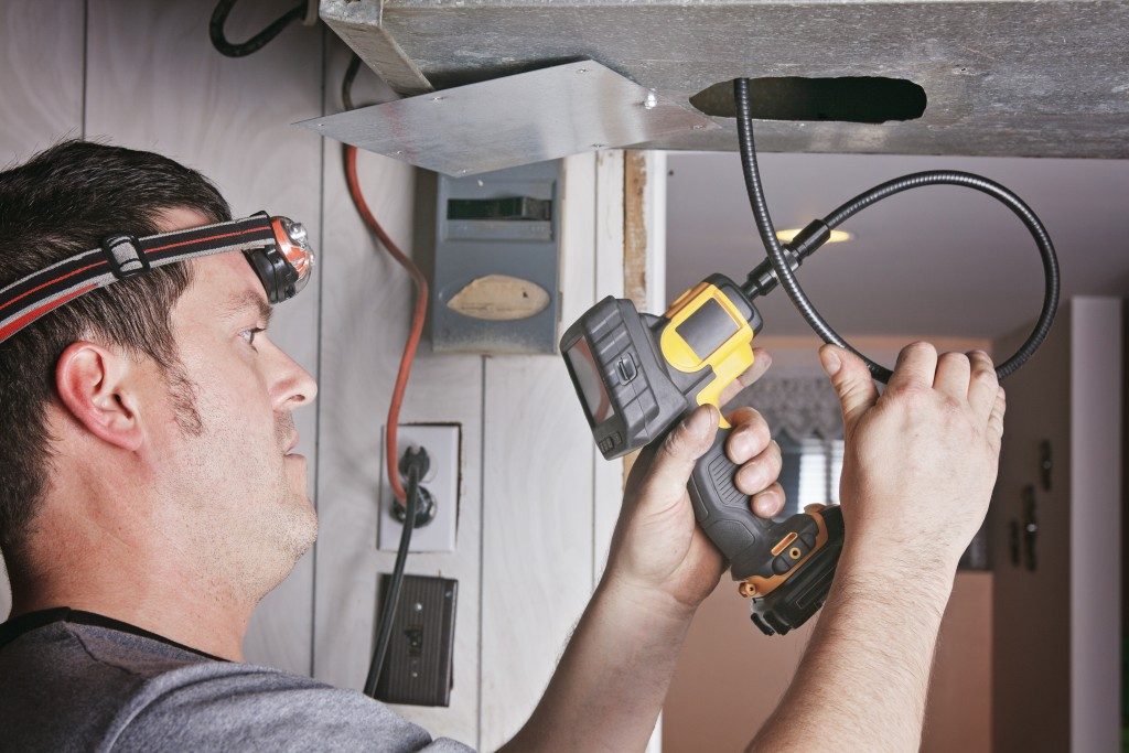 Man checking furnace