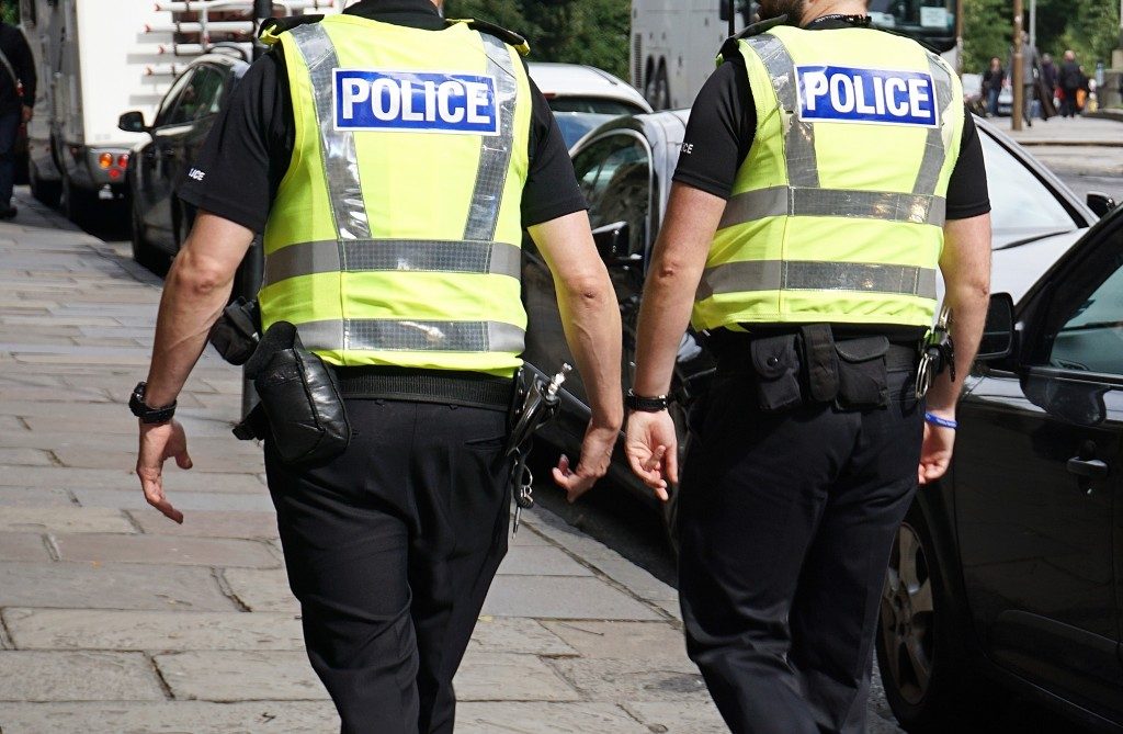 two police officers walking