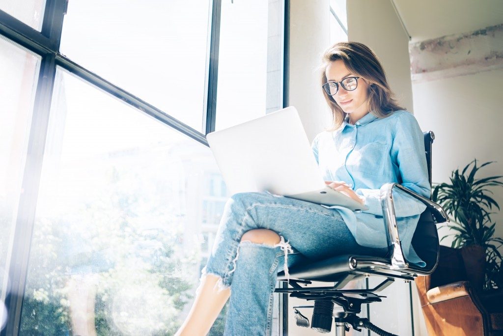 Woman using her laptop