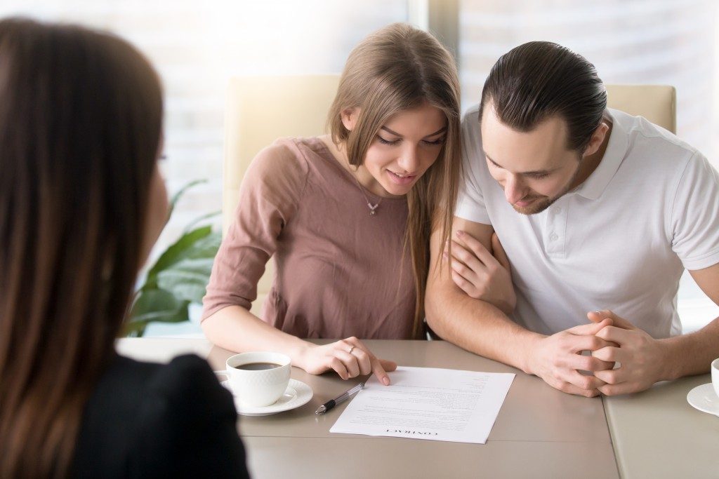 couple reading a document