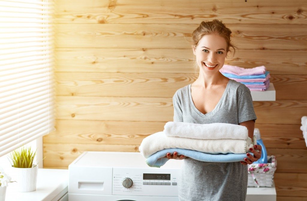 Woman in laundry room