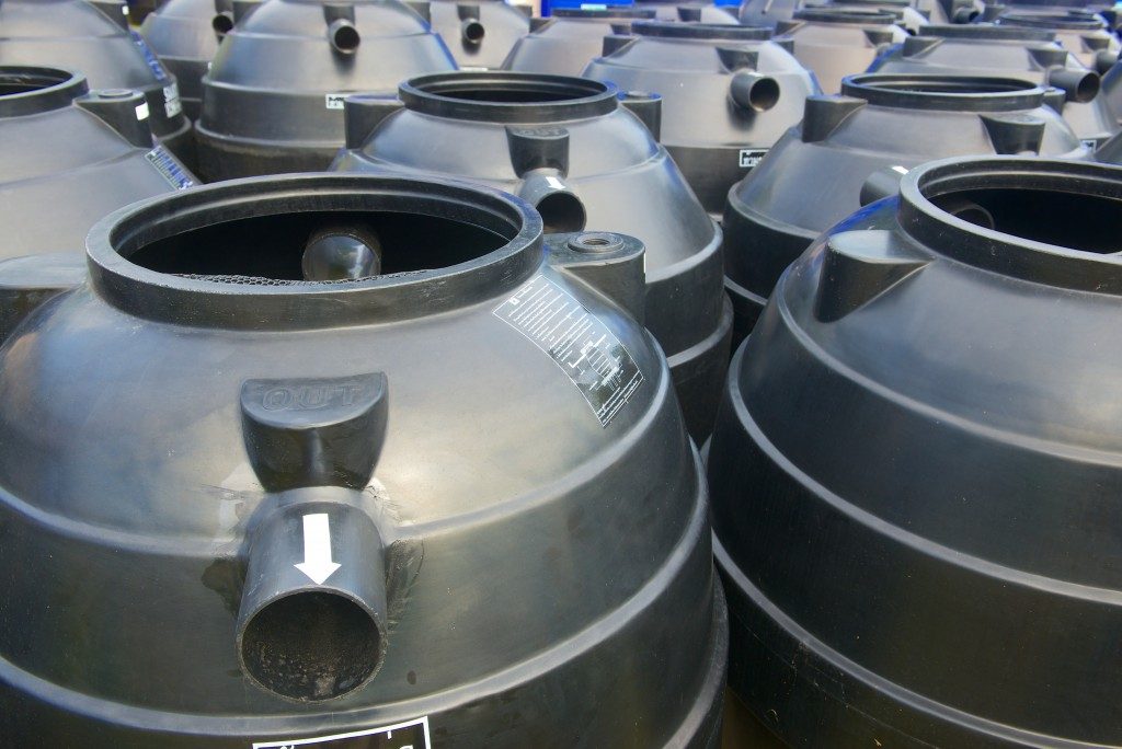 black plastic water storage tanks