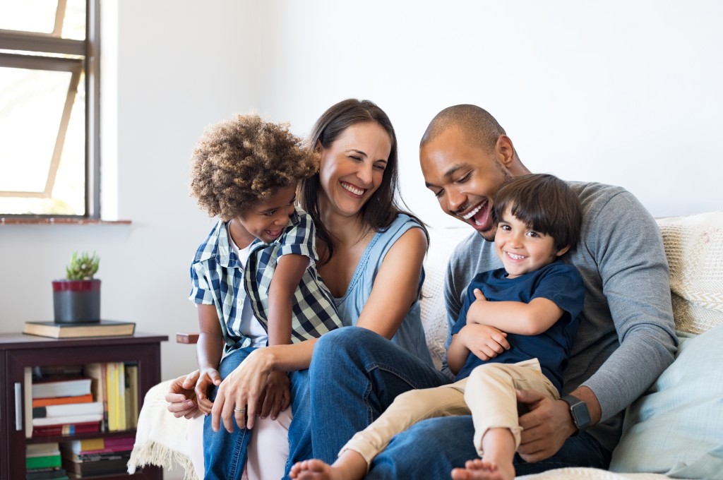 family sitting on the couch