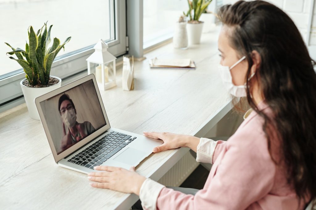 person using laptop