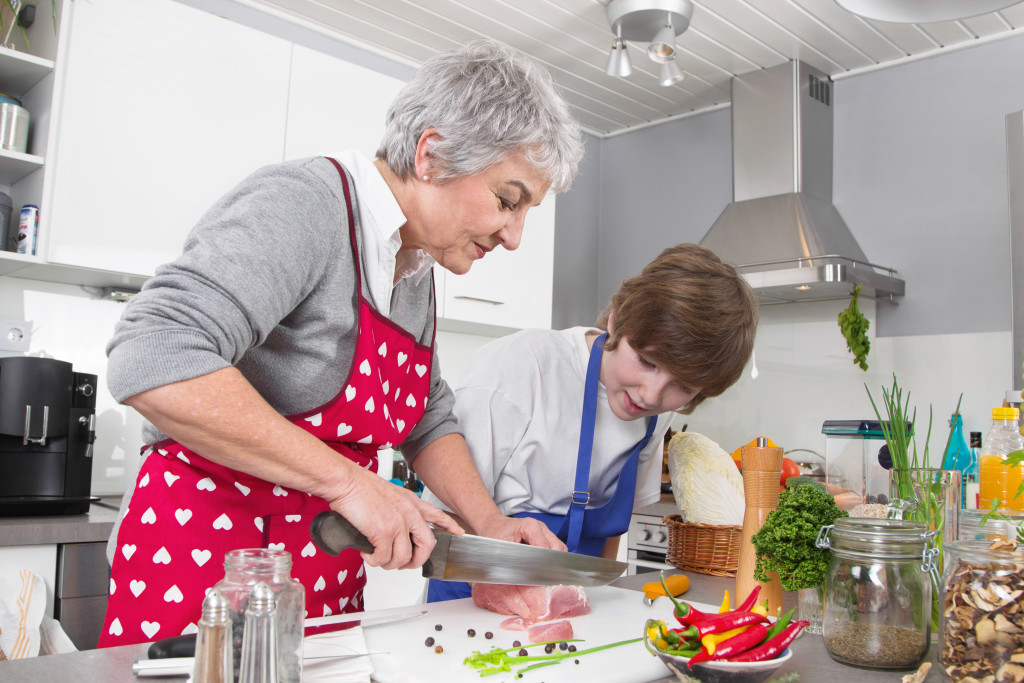 grandmother and child cooking