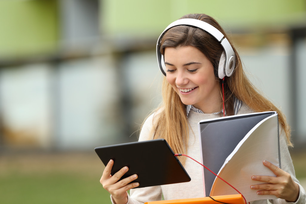 woman doing online class outside